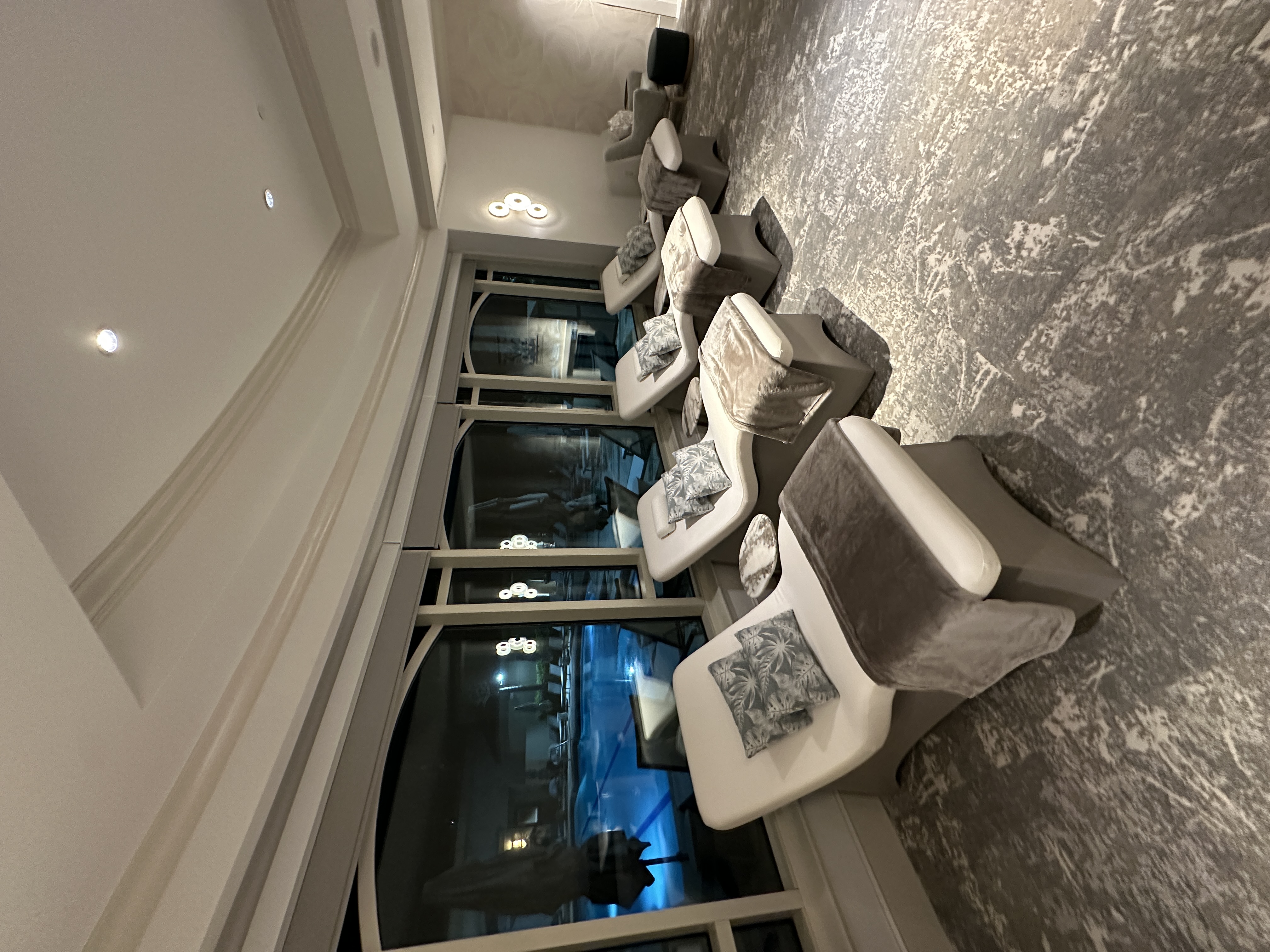 Spa lounge with night pool view