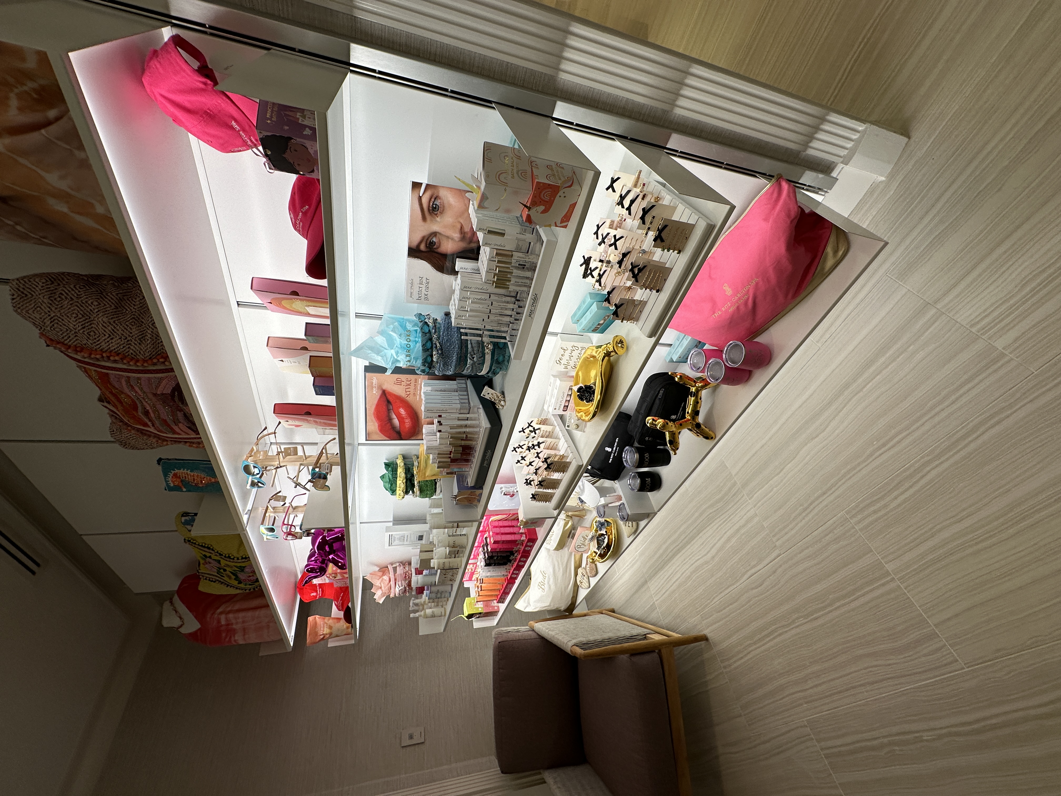 Illuminated beauty product retail shelving
